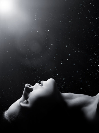 sensual sleeping woman profile on black backgroundÐ± monochromeの写真素材