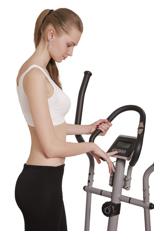 young slim woman check cardio after exercisingの写真素材