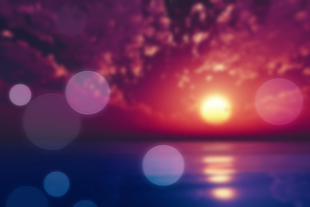 purple sunset over tropic sea blurred backgroundの写真素材