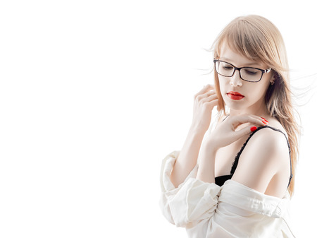sensual blond woman with naked shoulders isolated on white backgroundの写真素材