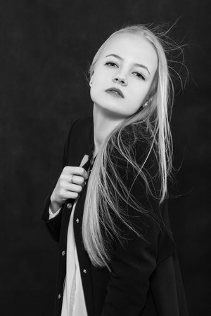 luxury blond girl on black background monochromeの写真素材