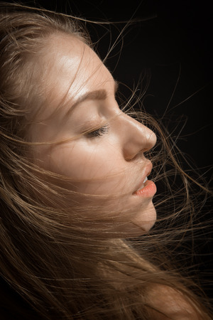 pretty girl with hairs on her faceの写真素材