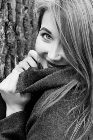 happy girl with red hair smiling portrait monochromeの写真素材