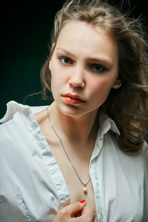 sensual serious woman with long hairの写真素材