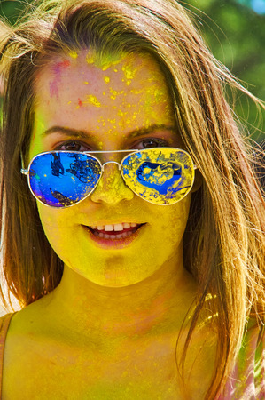 happy girl at Holi Festivalの写真素材
