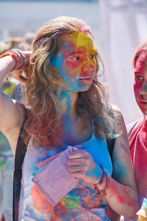 KALININGRAD, RUSSIA - JUNE 06, 2015: People with multicolored faces during the Holi Festival of Colors. Holi is a festival celebrated as a festival of coloursのeditorial素材