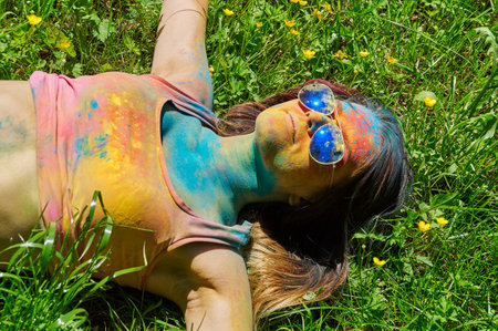 KALININGRAD, RUSSIA - JUNE 06, 2015: People with multicolored face during the Holi Festival of Colors. Holi is a festival celebrated as a festival of coloursのeditorial素材
