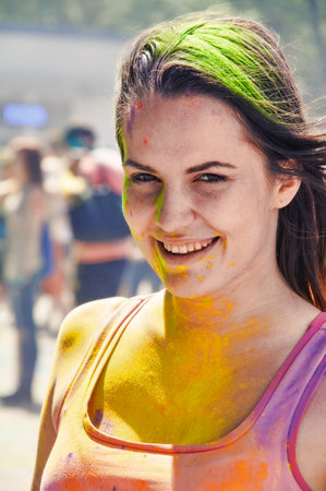 KALININGRAD, RUSSIA - JUNE 06, 2015: People with multicolor paint dust during the Holi Festival of Colors. Holi is a festival celebrated as a festival of coloursのeditorial素材
