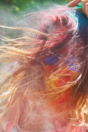 KALININGRAD, RUSSIA - JUNE 06, 2015: People with multicolored face during the Holi Festival of Colors. Holi is a festival celebrated as a festival of coloursのeditorial素材