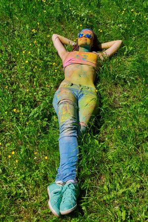 KALININGRAD, RUSSIA - JUNE 06, 2015: People with multicolored face during the Holi Festival of Colors. Holi is a festival celebrated as a festival of coloursのeditorial素材
