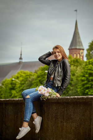 happy woman with flowers bouquetの写真素材