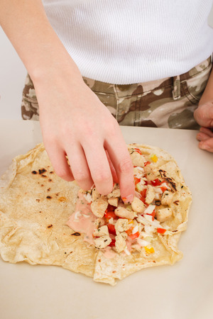 woman preparing of homemade shwarma or doner kebabの写真素材