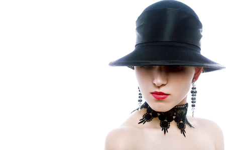luxury woman in black hat isolated on white background