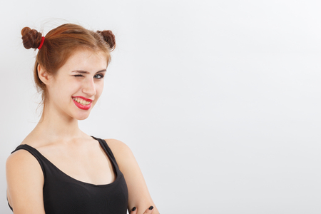 fun happy girl on white background with copy space smilingの写真素材