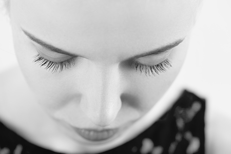beautiful woman with a natural beauty makeup look on a white background, monochromeの写真素材