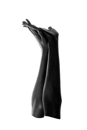 female hands painted in black color isolated on white background, monochromeの写真素材