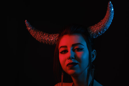 Taurus Zodiac Sign. Astrology and horoscope concept, Beautiful woman with horns and creative makeup...