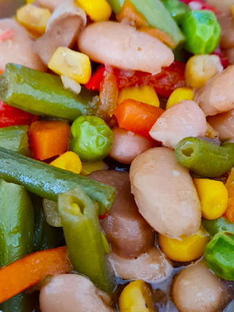 stew with beans and vegetables close up top view