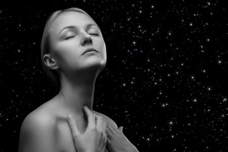 beautiful blond sensual topless middle age woman on stars background, monochromeの写真素材