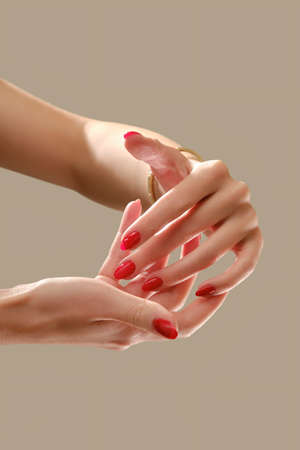 luxury female hands on white background posing close upの写真素材