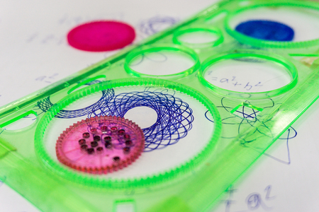 Spirograph toy on paper reduction.の写真素材