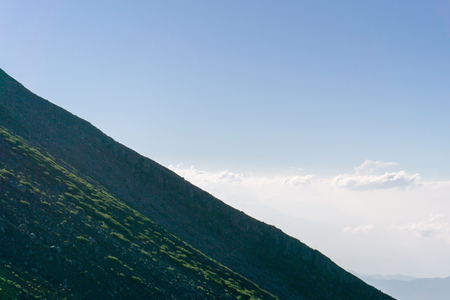 Mount Fuji, Japan. Hikers ascending Mount Fuji on a clear summer day.の写真素材