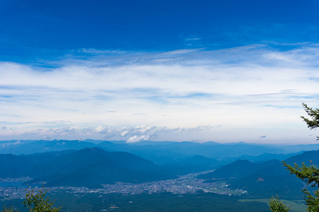 Mount fuji, japan climbing from yoshida trail. View of kawaguchiko and mount Fuji foothills.の写真素材