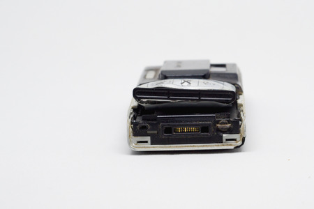 Old bloat damage battery for cellphone on a white background.の写真素材