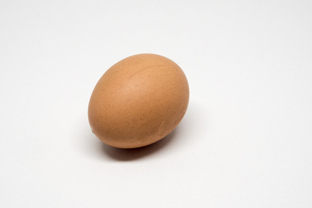 Close up of an egg isolated on white backgroundの写真素材