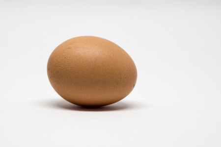 Close up of an egg isolated on white backgroundの写真素材
