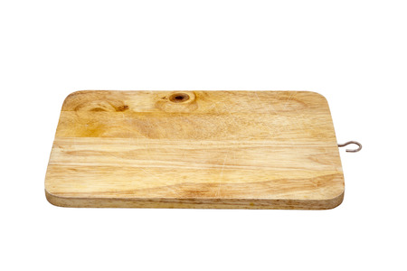 wooden cutting board isolated on a white backgroundの写真素材