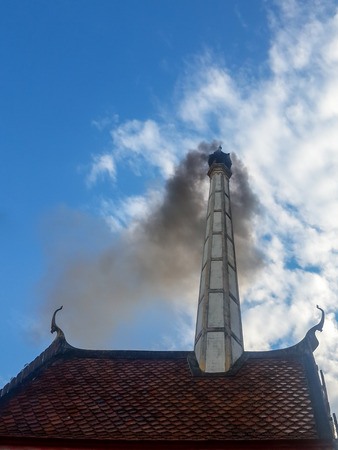 A Crematory with gray cloud background in Thailand.の写真素材