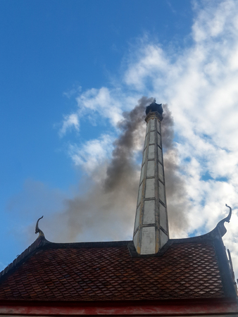 A Crematory with gray cloud background in Thailand.の写真素材