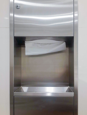 Soft focus tissues paper towel dispenser on granite wall in barthroomの写真素材