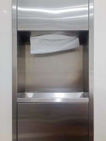 Soft focus tissues paper towel dispenser on granite wall in barthroomの写真素材
