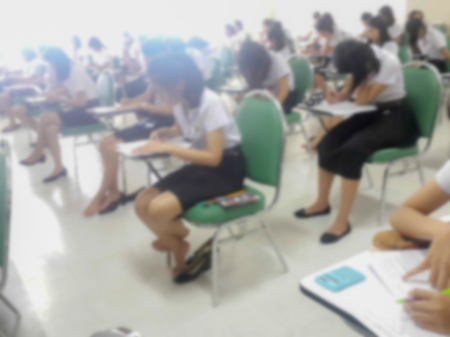Blur background of student during exams in University classroom.の写真素材