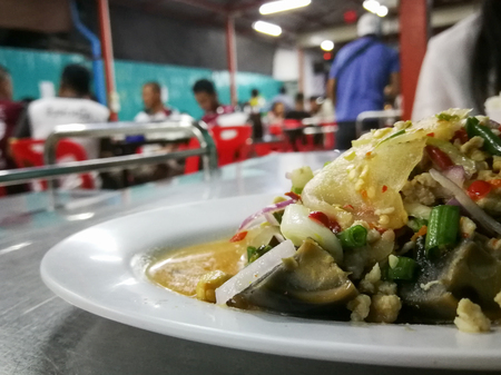 Close up and selective focus Spicy black preserved eggs salad Thailand foodの写真素材