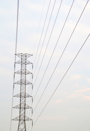 High Voltage electric pole and electric wire with blue skyの写真素材