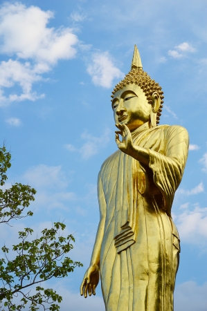 buddha standing on a mountain Wat Phra That Khao Noi, Nan Province, Thailandの写真素材