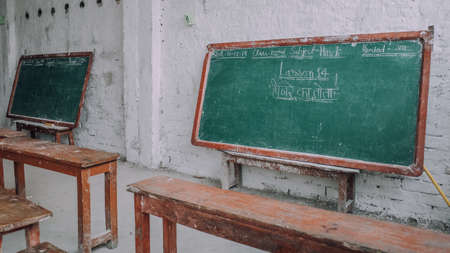 rural area empty classroom with chalkboardの写真素材