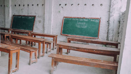 rural area empty classroom with chalkboardの写真素材