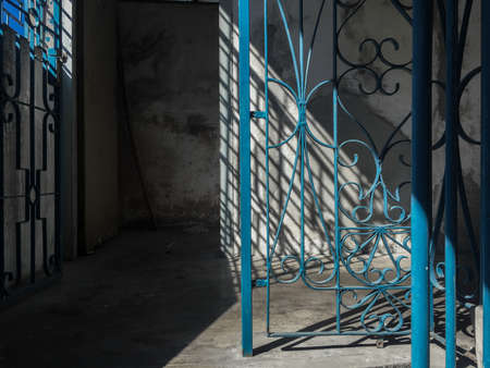 blue colour wrought iron fenceの写真素材