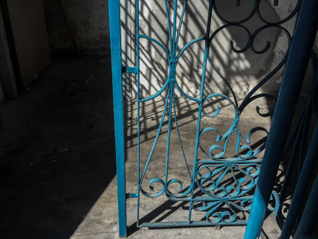 blue colour wrought iron fenceの写真素材