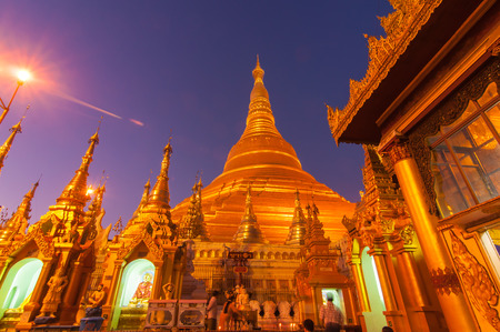Yangon,Myanmar-February 19,2014  Buddhist watering in to Wednesday morning Buddha at Shwedagon Pagoda のeditorial素材