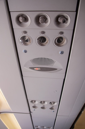 sign, symbol and some equipment inside airplane