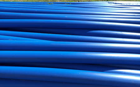 big blue pipe in the villageの写真素材