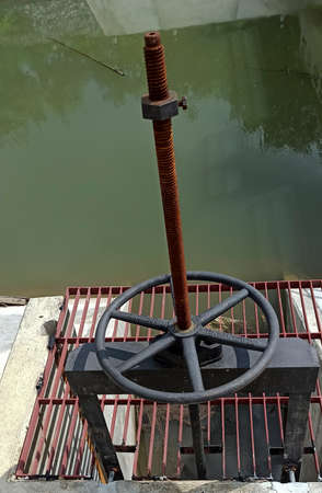 big valve for opening and closing the dam.の写真素材