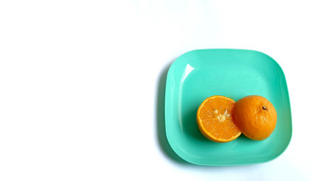 oranges in a plateの写真素材
