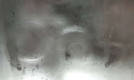 water droplets on glassの写真素材