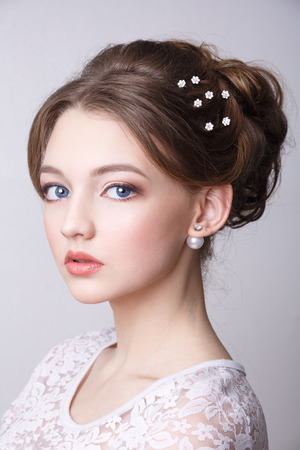 professional makeup. portrait of a very pretty girl model in a studio. retouchの写真素材
